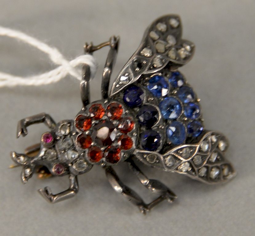 Appraisal: Silver fly brooch set with diamonds blue and red stones