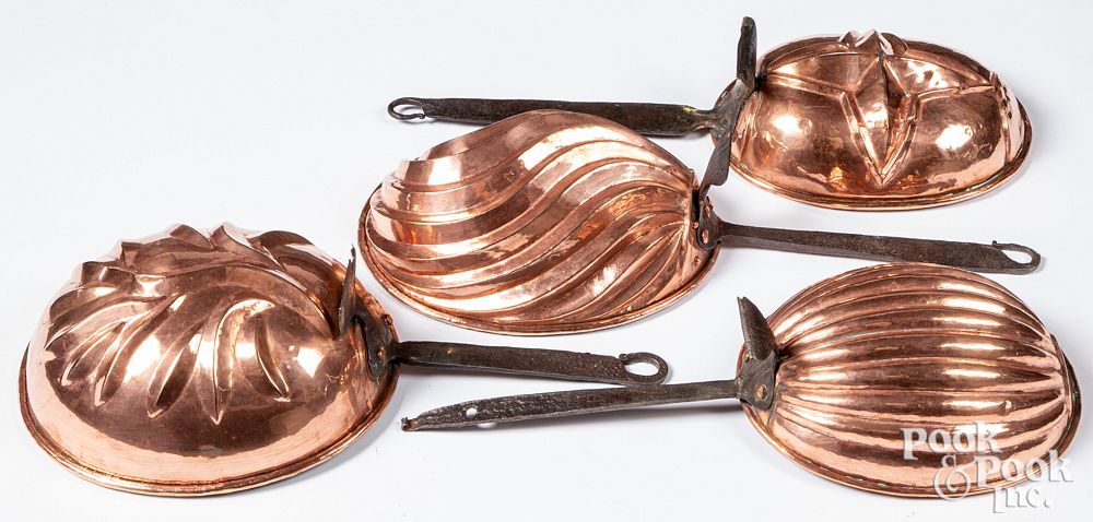 Appraisal: Four antique copper food molds Four antique copper food molds