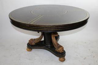 Appraisal: Maitland Smith leather top foyer table on dolphin base Maitland