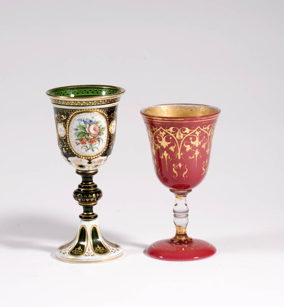 Appraisal: GREEN OVERLAY GOBLET WITH FLORAL DECORATION AND A PINK CASED-GLASS