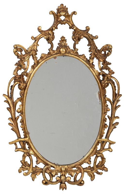 Appraisal: Rococo Carved Giltwood Oval Mirror Continental probably th century leaf