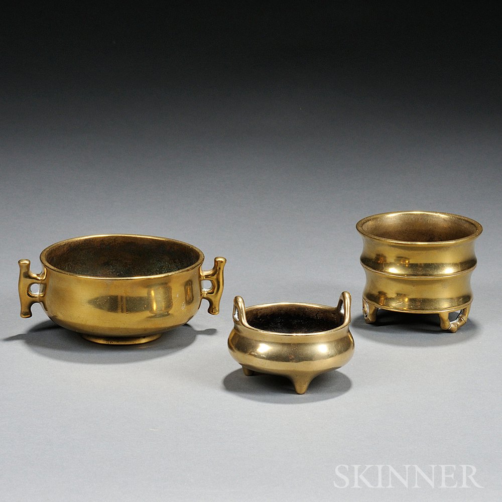 Appraisal: Three Small Polished Bronze Censers China th century a cylindrical