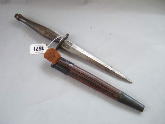 Appraisal: A Fairburn sykes fighting knife by Wilkinson sword with double