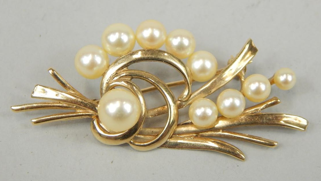 Appraisal: A ct gold and pearl bead abstract design brooch g