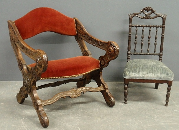 Appraisal: - Italian walnut campaign chair with extensive carvings h x