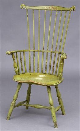 Appraisal: COMB-BACK WINDSOR ARMCHAIR Formally a commode chair the top rail