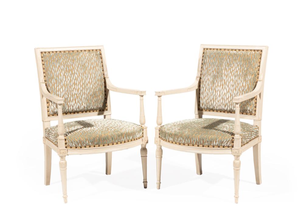 Appraisal: Pair of Directoire-Style Creme Peinte Fauteuils square back baluster uprights