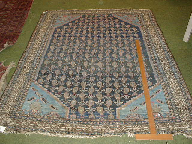 Appraisal: A Turkish design blue ground multi gull rug