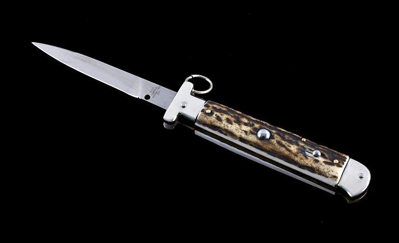 Appraisal: Campolin Italian Ring Pull Stiletto Switchblade This is an Italian