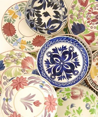 Appraisal: A collection of twenty-five earthenware bowls with bright floral decoration