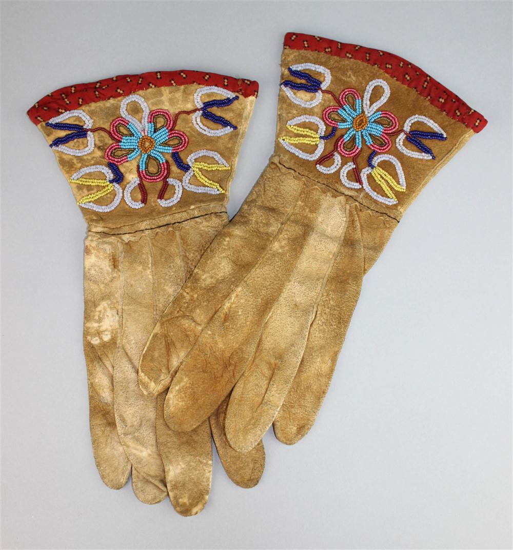 Appraisal: PAIR OF NATIVE AMERICAN BEADED HIDE GAUNTLETS ca supple hide