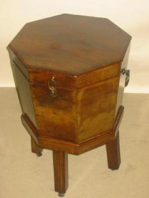 Appraisal: A MAHOGANY WORK BOX of octagonal tapering form the hinged