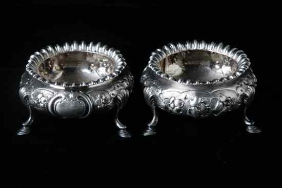 Appraisal: PAIR VICTORIAN SILVER SALTS Edward Ker Reid London Circular with