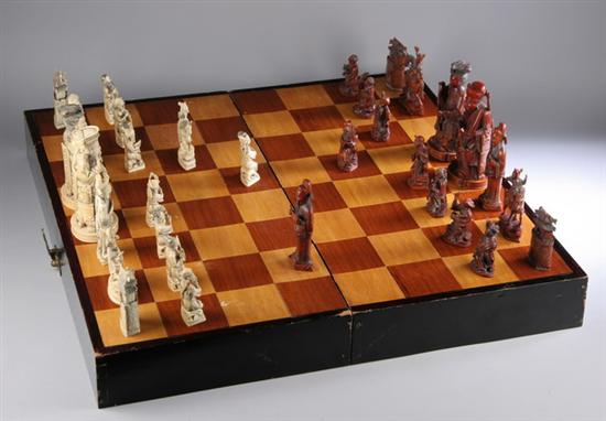 Appraisal: CHINESE IVORY FIGURAL CHESS SET In fitted wooden box -