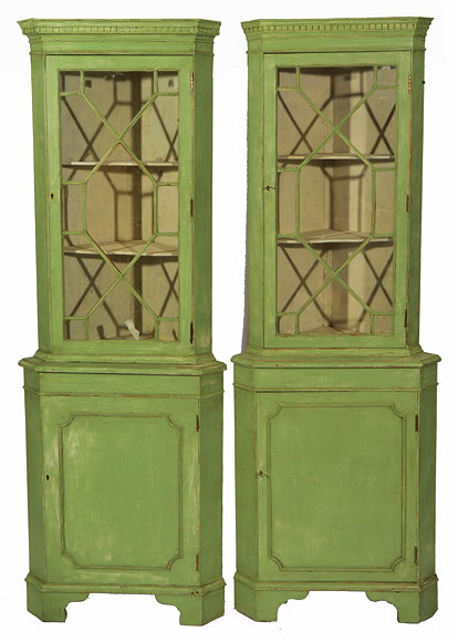 Appraisal: A PAIR OF GEORGIAN STYLE GREEN PAINTED FLOOR STANDING CORNER