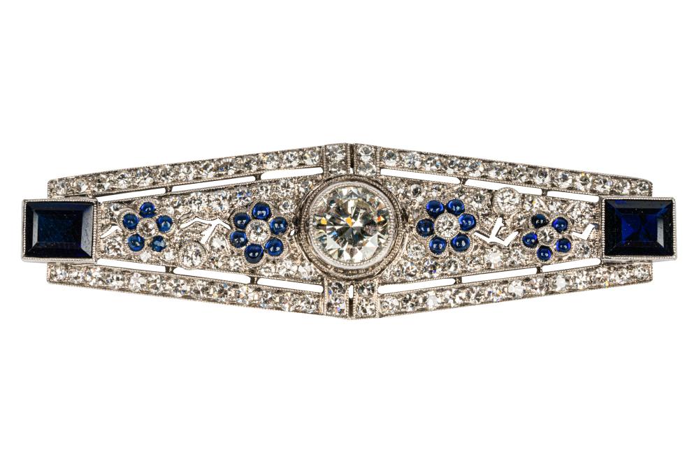 Appraisal: ART DECO PLATINUM DIAMOND SAPPHIRE BAR BROOCHcentering one round brilliant