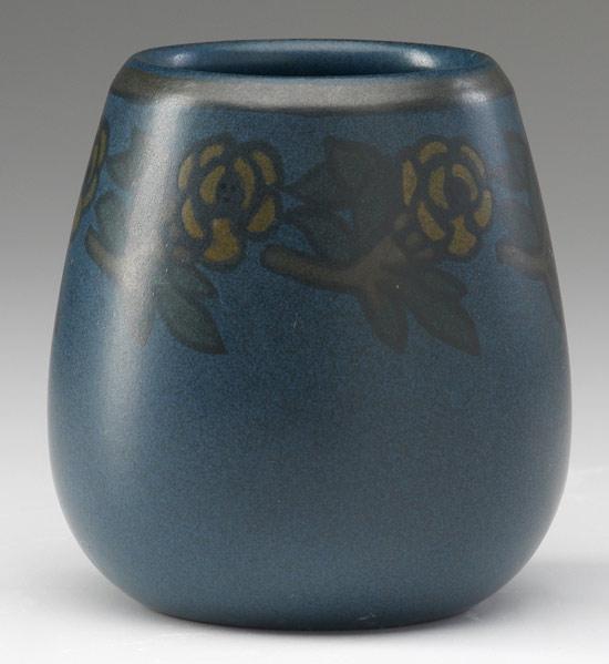 Appraisal: MARBLEHEAD Small tapered vase nicely painted by Hennessey with flowers