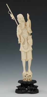 Appraisal: Carved Ivory Fisherman with Catch Standing fisherman with catch and