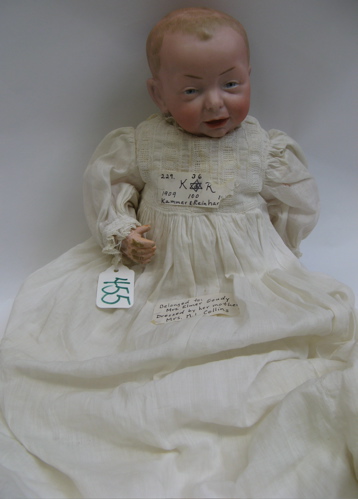 Appraisal: KAMMER REINHARDT GERMAN CHARACTER BABY DOLL H C Molded bisque