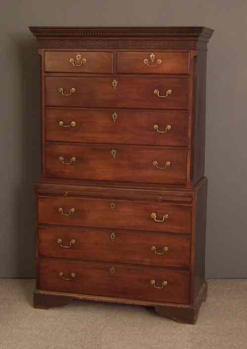 Appraisal: A George III mahogany tallboy with moulded and dentil cornice