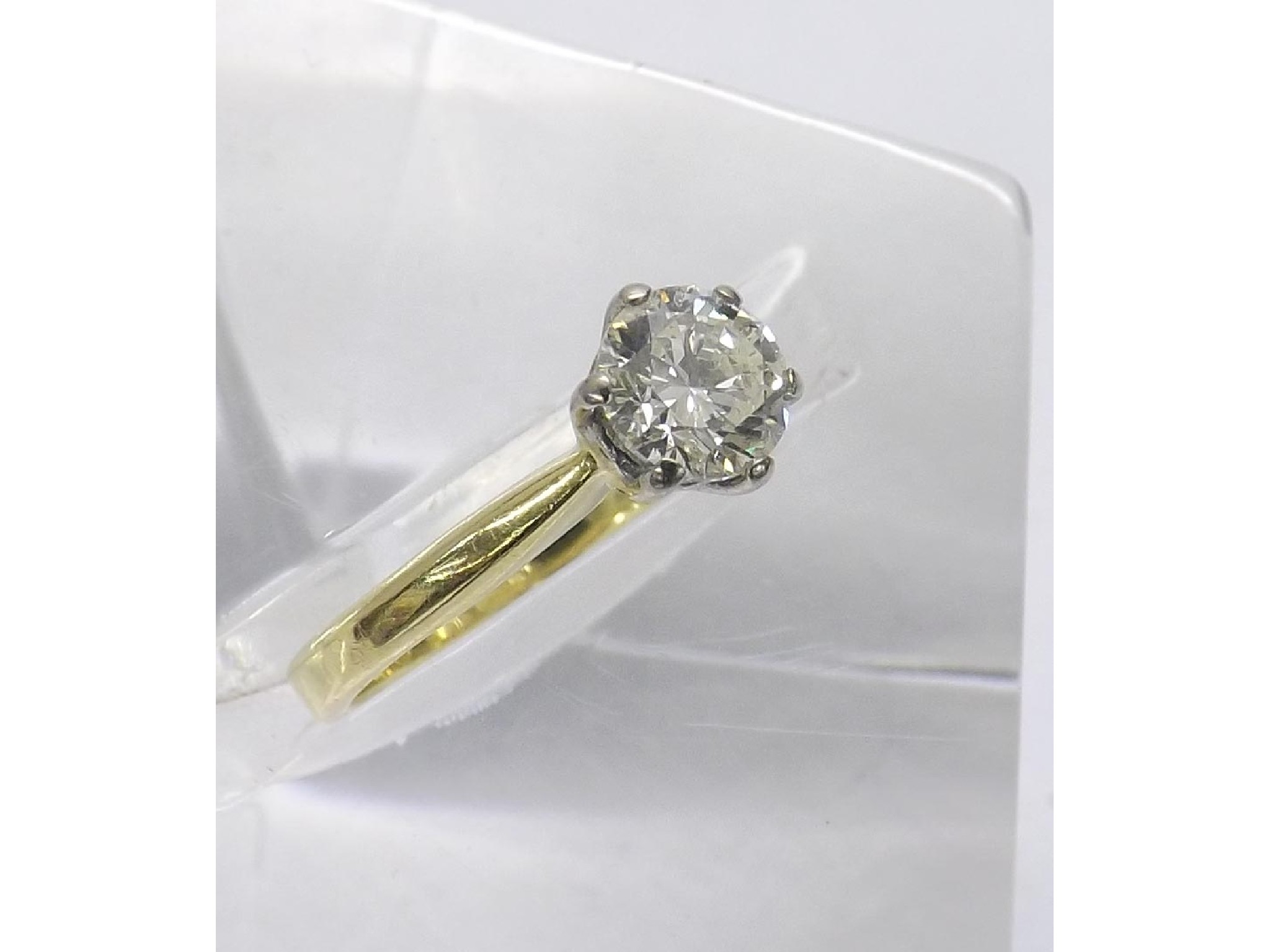 Appraisal: - -A ct yellow gold round brilliant-cut solitaire diamond ring