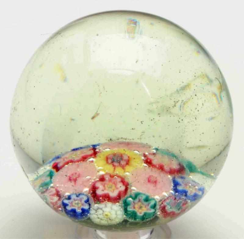 Appraisal: Single Pontil Millefiori Marble Beautiful colors of pink yellow red