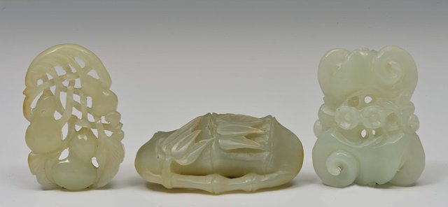 Appraisal: A CHINESE MUTTON FAT JADE PENDANT pierced and carved as