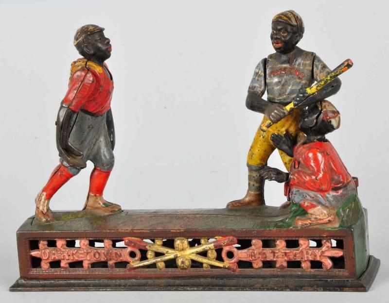 Appraisal: Cast Iron Darktown Battery Mechanical Bank Description Manufactured by J