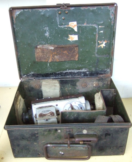 Appraisal: A bus conductor's ticket machine th century with leather strap