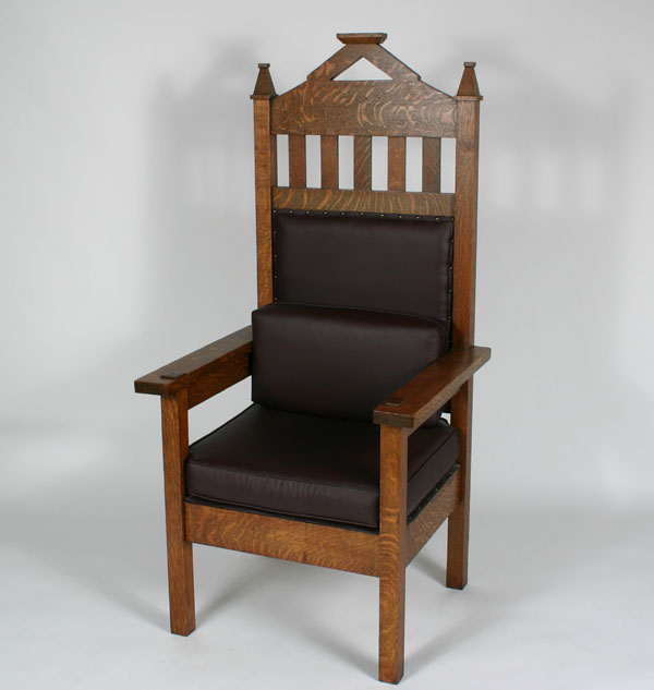 Appraisal: Arts Crafts Gothic influence throne arm chair made of quarter