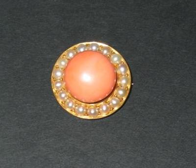 Appraisal: A VICTORIAN CORAL AND PEARL BROOCH of circular form with