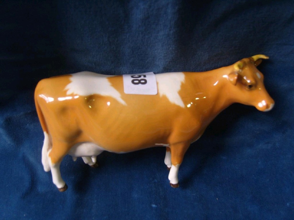 Appraisal: A Beswick model of a Guernsey cow horns separate