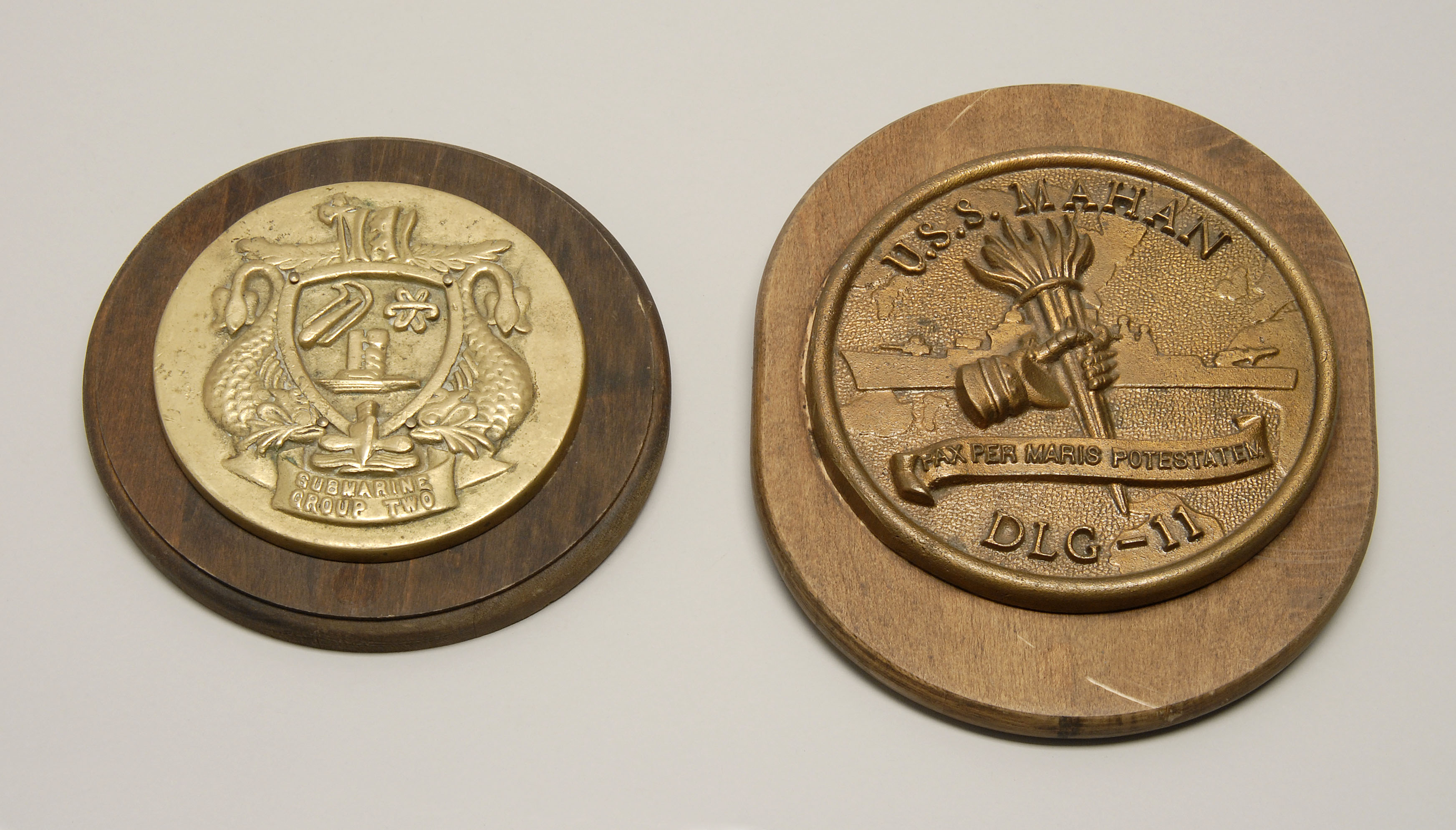 Appraisal: TWO BRONZE NAVAL PLAQUES One marked Submarine Group Two diameter