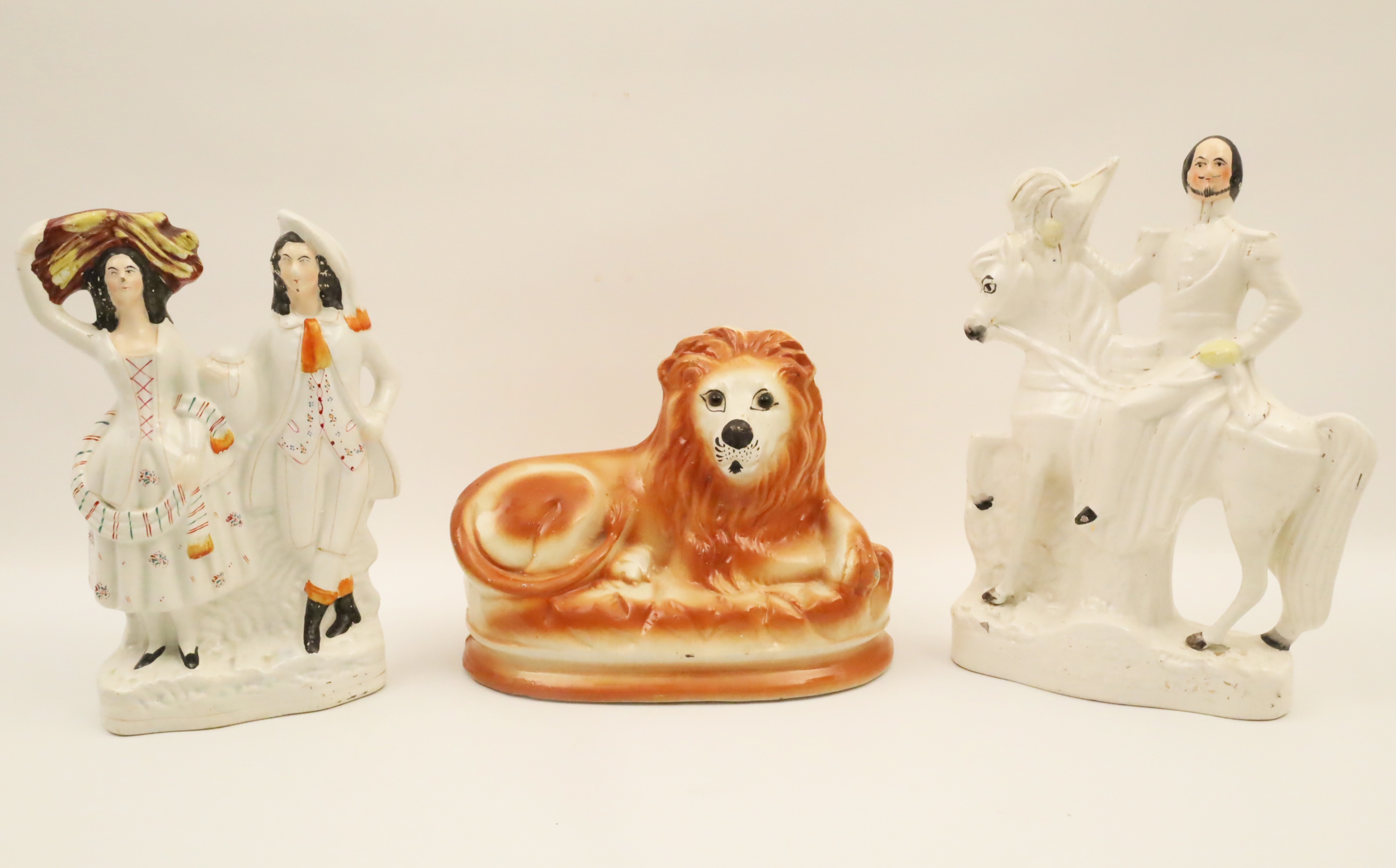 Appraisal: GROUP OF ENGLISH STAFFORDSHIRE PORCELAIN FIGURES Group of English Staffordshire