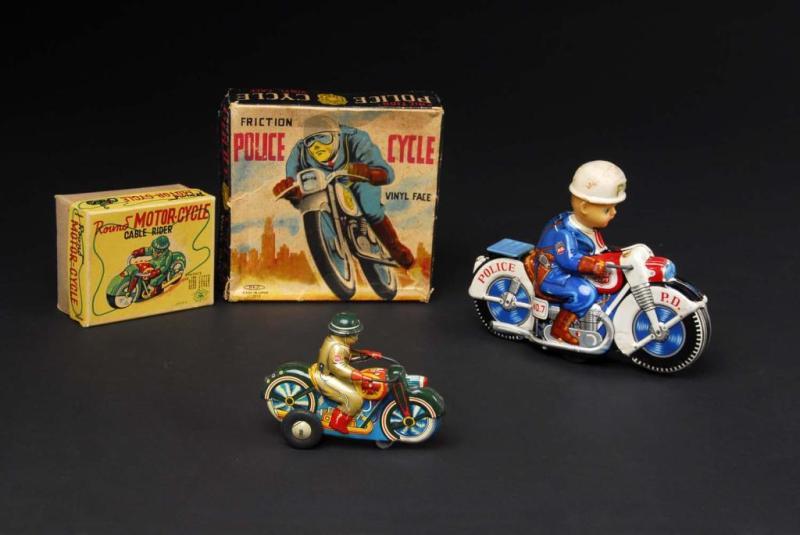 Appraisal: Lot of Tin Motorcycle Toys Description Japanese Both are working