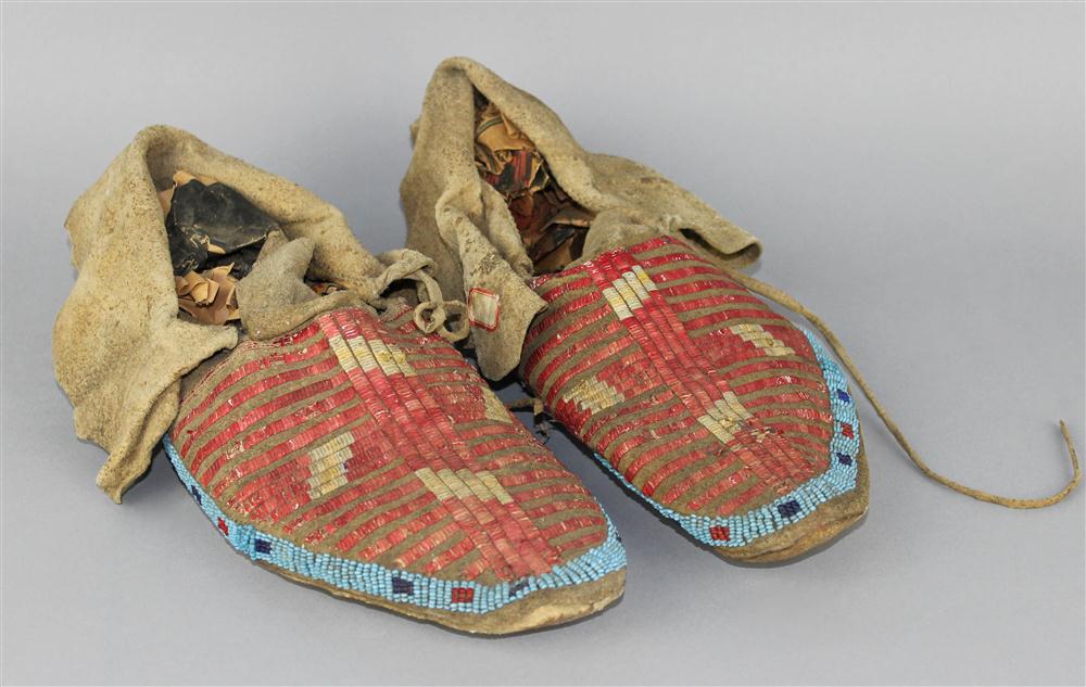 Appraisal: PAIR OF NATIVE AMERICAN BEADED AND QUILLED HIDE MOCCASINS PLAINS