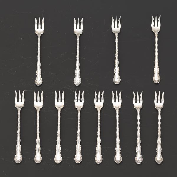 Appraisal: GORHAM TWELVE STERLING SILVER SEAFOOD COCKTAIL FORKS STRASBOURG PATTERN Twelve