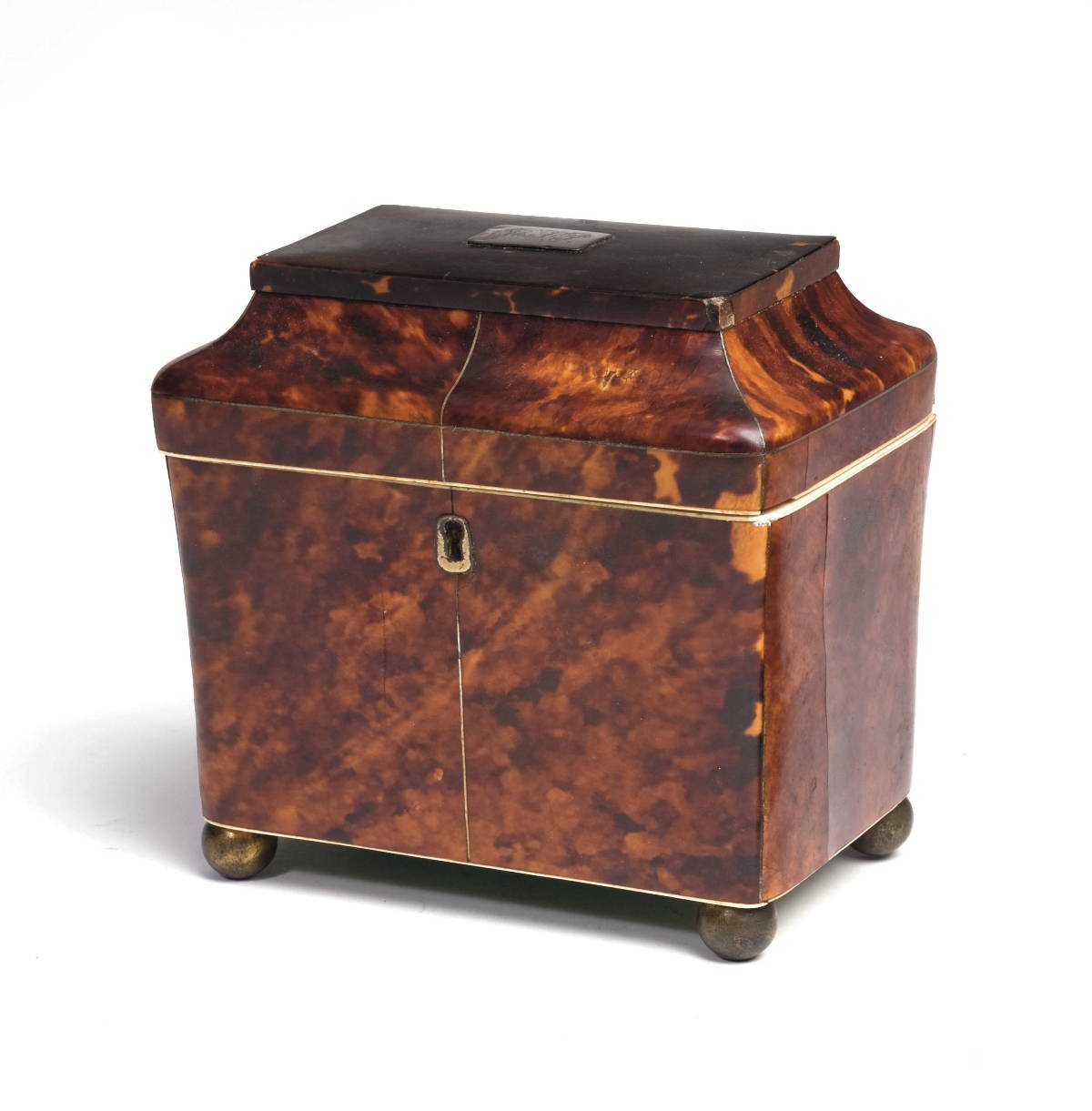 Appraisal: REGENCY FAUX-TORTOISESHELL TEA CADDY OF SARCOPHAGUS FORM The hinged top