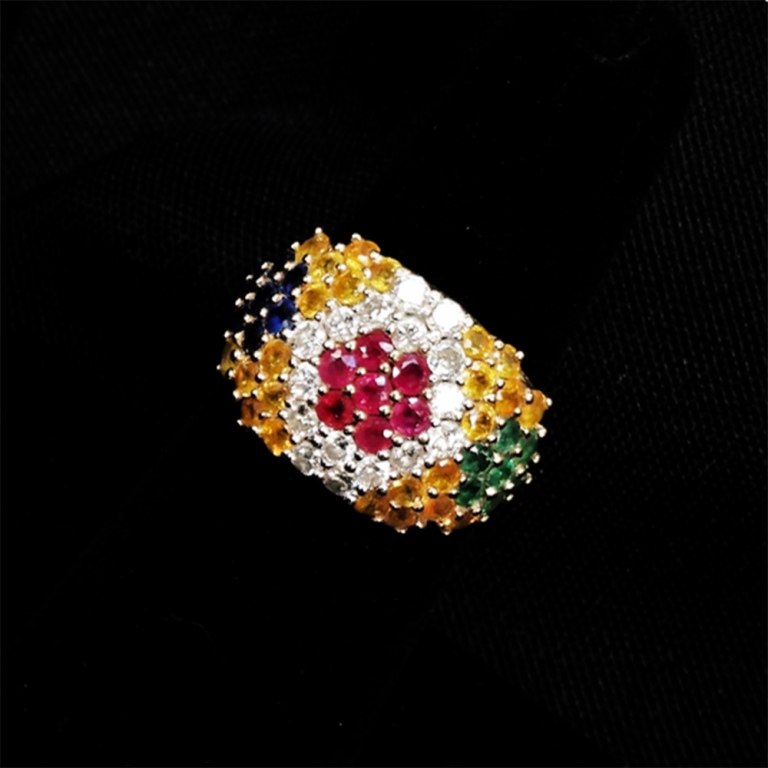 Appraisal: K GOLD DIAMOND RUBY SAPPHIRE EMERALD RING Seven mm center