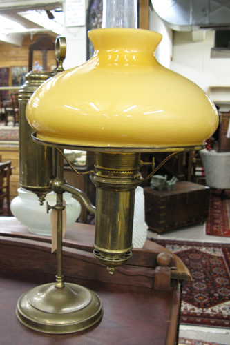 Appraisal: A BRASS PLATED ADJUSTABLE DESK LAMP having a fitted gold