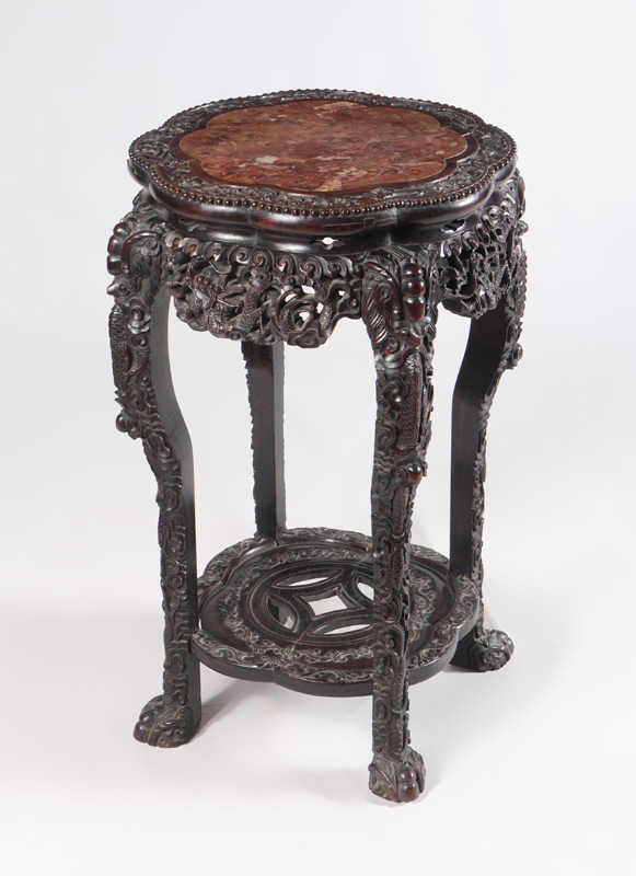 Appraisal: CARVED ORIENTAL MARBLE TOP STAND Floriform shaped inset marble top