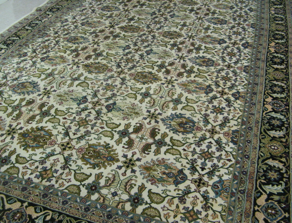 Appraisal: FINE PAKISTANI PERSIAN CARPET overall foliate design on ivory ground