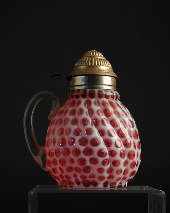 Appraisal: A th C Cranberry Opalescent Syrup Pitcher by unknown maker