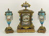 Appraisal: CLOCK SET - Three piece ornate gilded bronze mounted porcelain