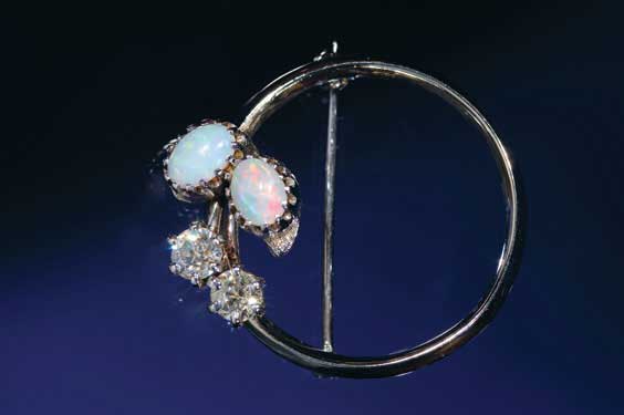 Appraisal: OPAL AND DIAMOND BROOCH K white gold opal and diamond