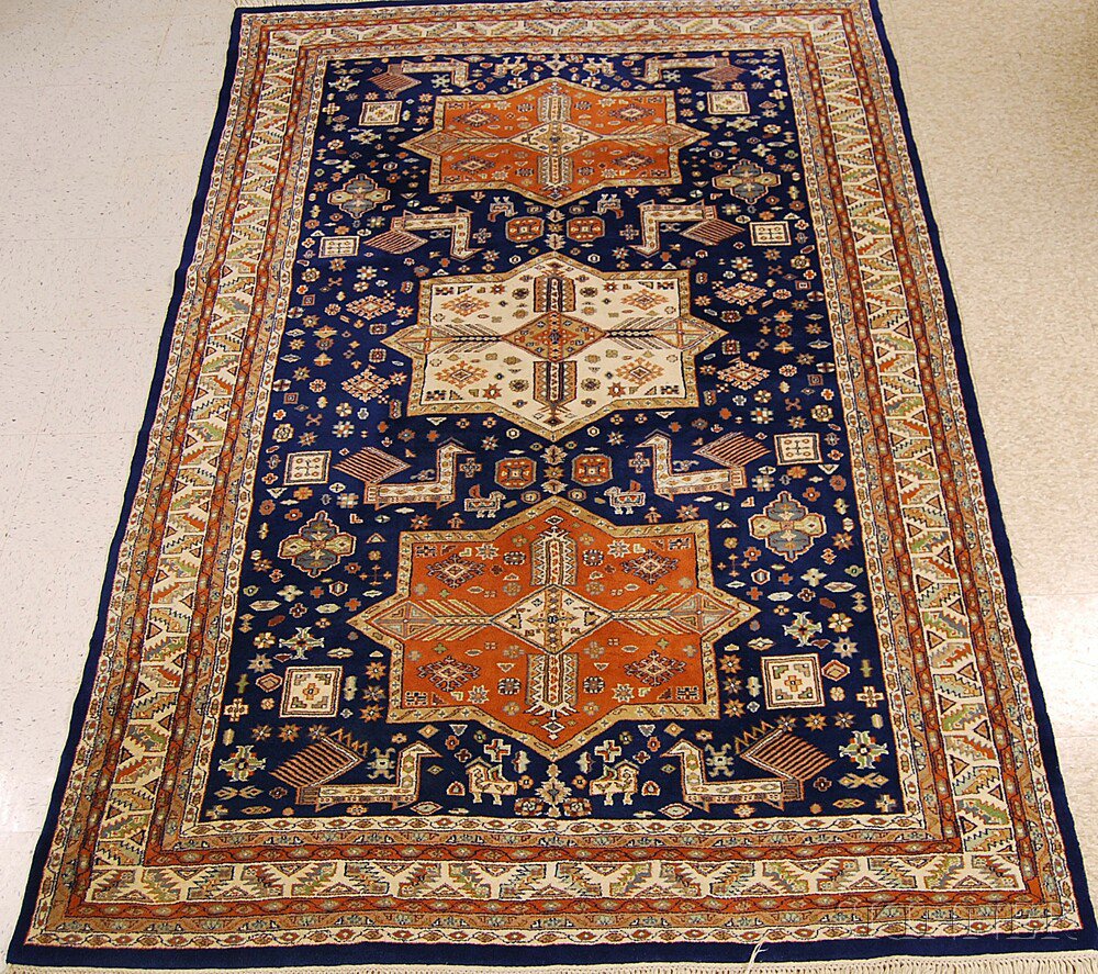 Appraisal: Caucasian-style Rug India contemporary ft x ft in Estimate -