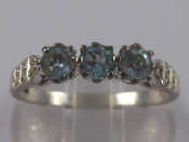 Appraisal: A carat white gold blue topaz and diamond ring size