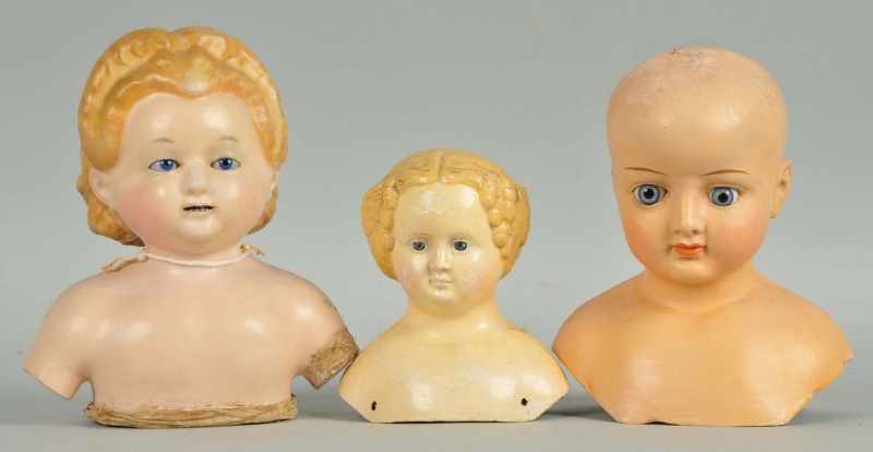 Appraisal: Lot of Early German Doll Heads Description Composition shoulder head