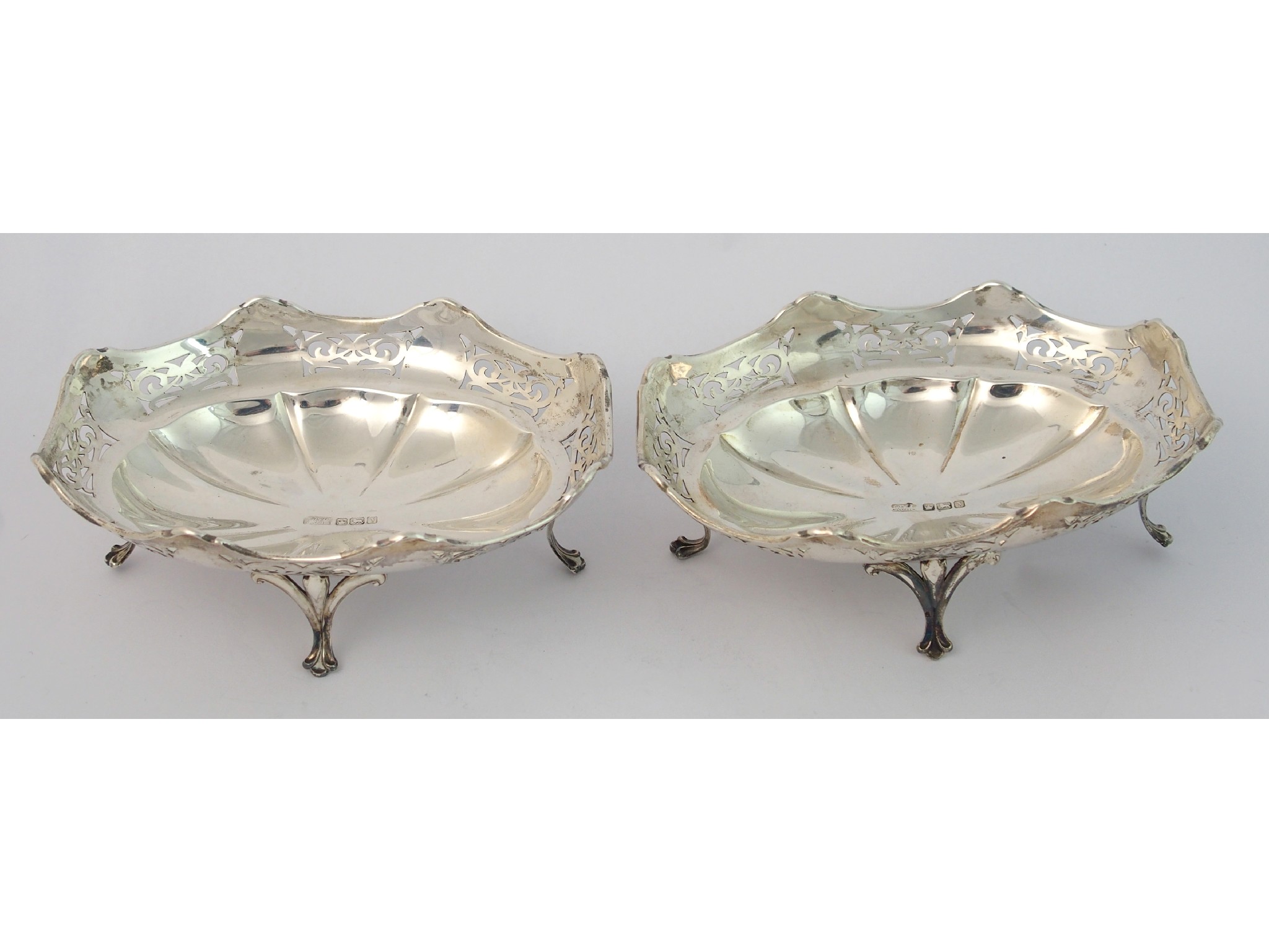 Appraisal: A pair of bon bon dishesof oval form with shaped