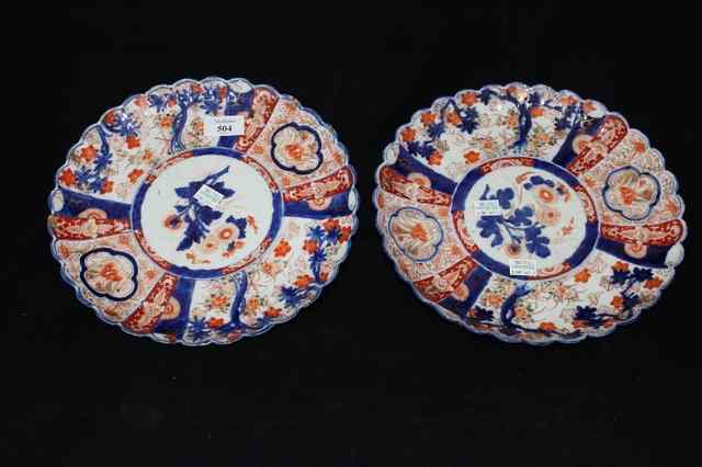 Appraisal: A PAIR OF ORIENTAL LOBED DISHES decorated in Imari colours